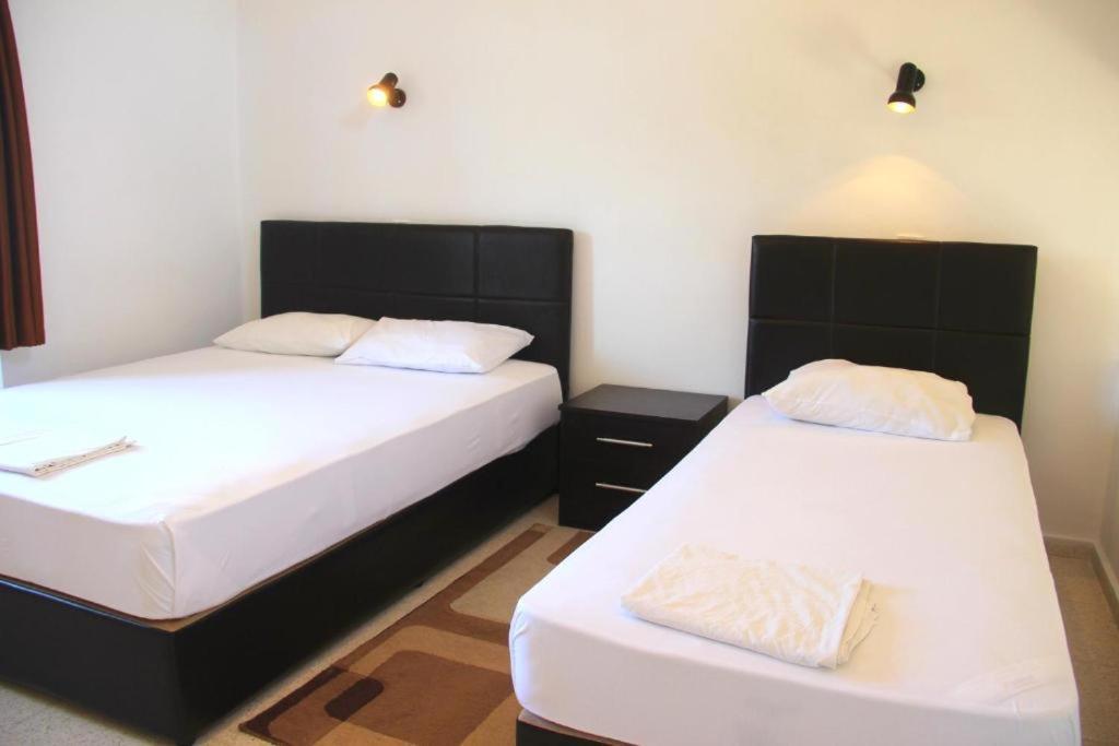 Bare Hill Holiday Apartments Krini Rom bilde